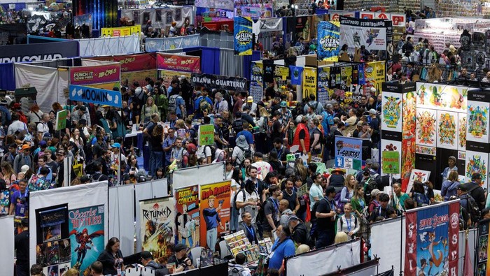 Costumed attendees pose for a picture during opening day of Comic-Con International in San Diego, California, U.S. July 24, 2025.   REUTERS/Mike Blake