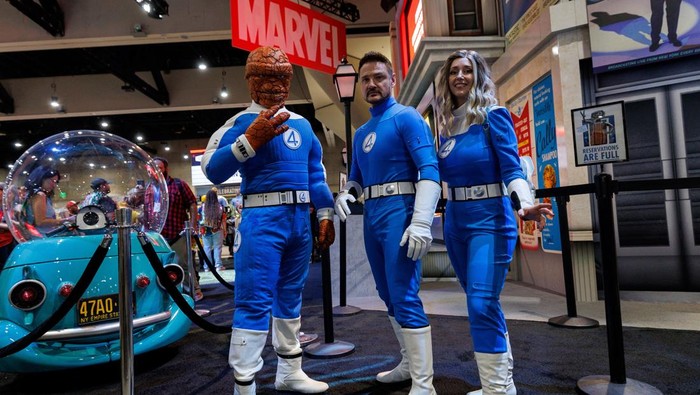 Costumed attendees pose for a picture during opening day of Comic-Con International in San Diego, California, U.S. July 24, 2025.   REUTERS/Mike Blake