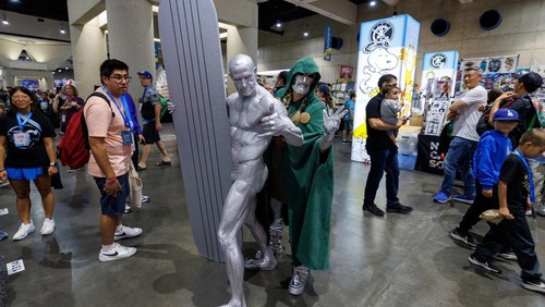 Costumed attendees pose for a picture during opening day of Comic-Con International in San Diego, California, U.S. July 24, 2025. REUTERS/Mike Blake
