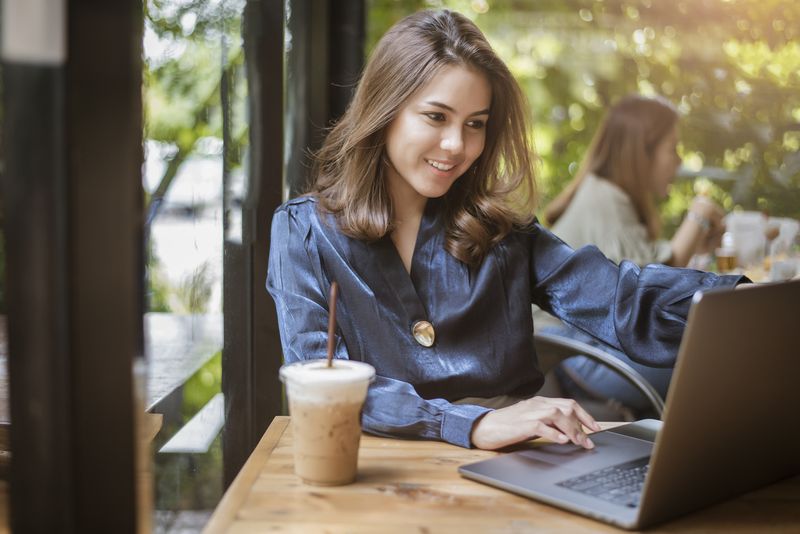 Smart business woman is working with computer