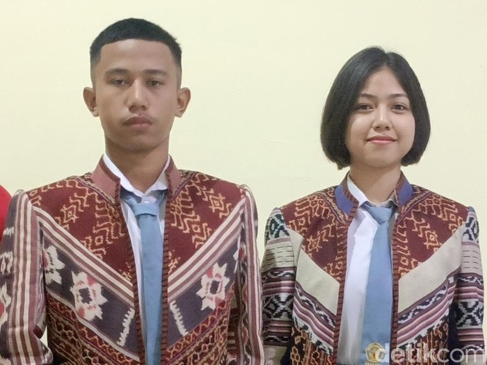 Paulus Gregorius Afrizal dan Merlin Anggraeni Mausali, dua pelajar NTT yang terpilih menjadi anggota Paskibraka Nasional pada HUT RI 17 Agustus 2025.(Foto: Simon Selly/detikBali)