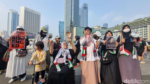 Aksi bela Palestina di CFD Bundaran HI. (Taufiq/detikcom)