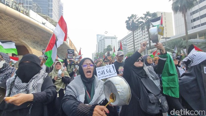 Aksi bela Palestina di CFD Bundaran HI. (Taufiq/detikcom)