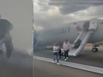 Penumpang Pria yang Bawa Koper saat Evakuasi Pesawat Dirujak Netizen