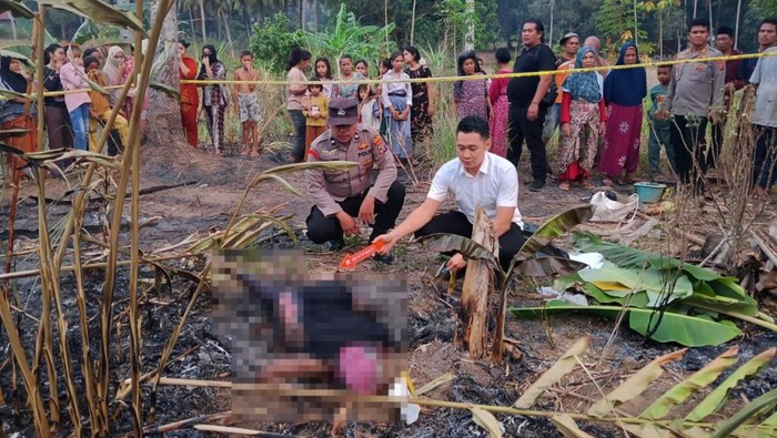 Polisi saat olah TKP penemuan jasad korban. (Foto: Dok. Polres Tapsel)