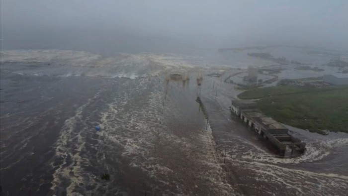 Tsunami waves flood an area after a powerful magnitude 8.8 earthquake struck off Russias far eastern Kamchatka Peninsula, in Severo-Kurilsk, Sakhalin Region, Russia, July 30, 2025, in this still image taken from video.    Kamchatka branch of the Geophysical Survey of the Russian Academy of Sciences/Handout via REUTERS    THIS IMAGE HAS BEEN SUPPLIED BY A THIRD PARTY. NO RESALES. NO ARCHIVES. MANDATORY CREDIT