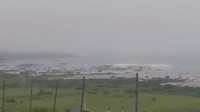 Air laut naik drastis membanjiri kawasan pantai di Severo-Kurilsk, Sakhalin, Rusia, Selasa (30/7/2025), pascagempa besar. Otoritas Rusia menyebut gempa berkekuatan tinggi itu berpotensi menimbulkan tsunami di sejumlah pesisir timur jauh. (Social media/via REUTERS) 