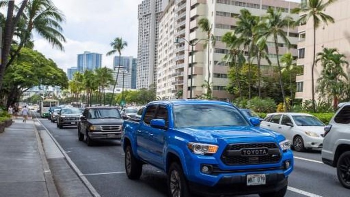 Vehicles depart Waikiki beach in Oahu, Hawaii on July 29, 2025, after an 8.7 earthquake off of Russias far east prompted tsunami alerts. A powerful 8.7 magnitude earthquake off Russias far east has prompted tsunami alerts across parts of the Pacific including Japan, Hawaii, Russia and Ecuador, and warnings along the California coast, US authorities said late on July 29. The massive temblor triggered warnings of waves up to three metres (10 feet) possibly hitting the coasts of Russia, Hawaii and even Ecuador and Chile along South Americas west coast, according to the US Pacific Tsunami Warning Center based in Honolulu, Hawaii. (Photo by Eugene Tanner / AFP)