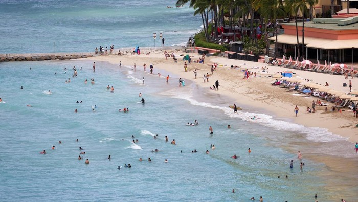 Waves slam into a sea wall off Waikiki Beach after authorities downgraded earlier tsunami warnings following an earthquake off Russia’s Far Eastern Kamchatka Peninsula, in Honolulu, Hawaii, U.S., July 30, 2025. REUTERS/Marco Garcia