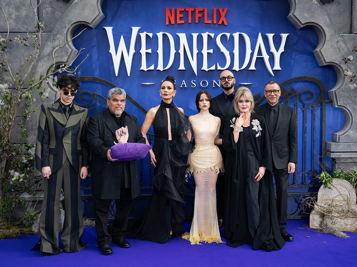 LONDON, ENGLAND - JULY 30:  (L-R) Isaac Ordonez, Luis Guzmán, Catherine Zeta-Jones, Jenna Ortega, Victor Dorobantu, Joanna Lumley and Fred Armisen attend the 