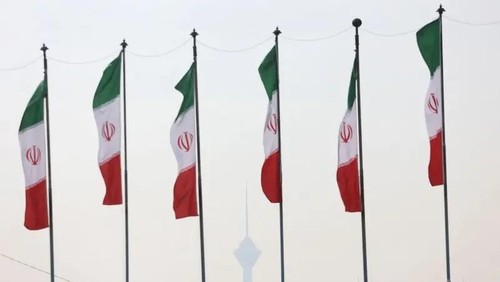 Iranian flags flutter in Tehran. (Via Reuters)