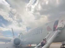 Roda American Airlines Keluarkan Asap, Penumpang Dievakuasi
