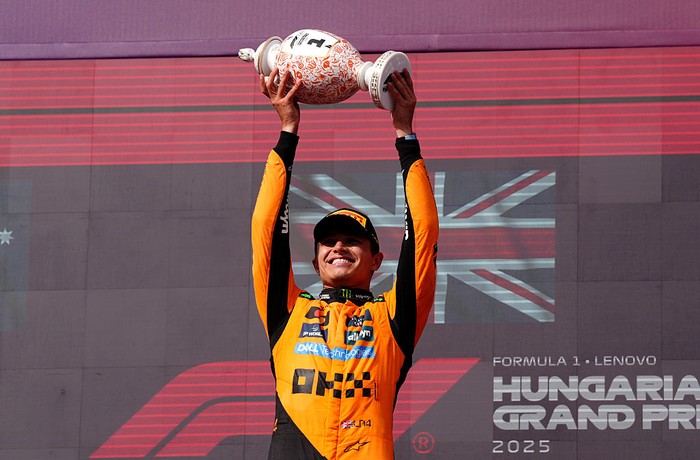 McLarens Lando Norris celebrates victory on the podium following the Hungarian Grand Prix at the Hungaroring in Budapest, Hungary. Picture date: Sunday August 3, 2025. (Photo by Bradley Collyer/PA Images via Getty Images)