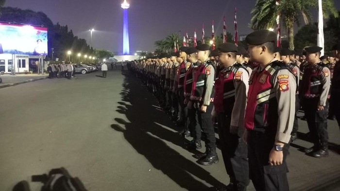Sebanyak 2.123 personel gabungan dikerahkan untuk mengamankan aksi bela Palestina di Monas, Jakarta, Minggu (3/8/2025) pagi.