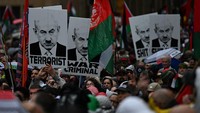 Aksi ini juga menyindir lambannya respons pemerintah Australia terhadap krisis di Gaza dan mendesak sikap yang lebih tegas. (AAP/Dean Lewins via REUTERS)  