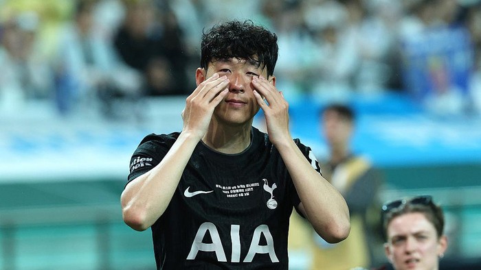 SEOUL, SOUTH KOREA - AUGUST 03: Heung Min Son of Tottenham Hotspur wipes away his tears during the pre-season friendly between Tottenham Hotspur and Newcastle United at Seoul World Cup Stadium on August 03, 2025 in Seoul, South Korea. (Photo by Han Myung-Gu/Getty Images)