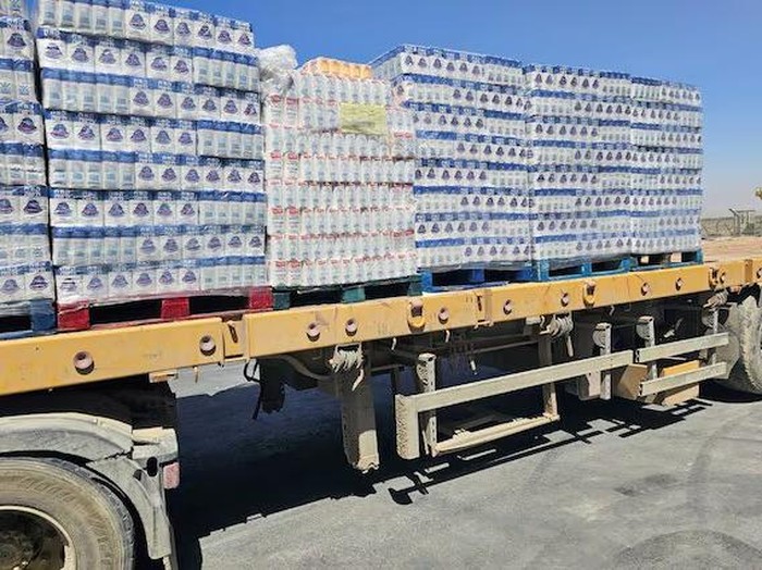 A truck loaded with aid is seen at the Kerem Shalom crossing between Israel and Gaza, on its Israeli side in this handout image obtained by Reuters on May 20, 2025. COGAT/Handout via REUTERS/File Photo Purchase Licensing Rights