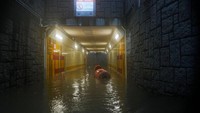 Sebuah terowongan pejalan kaki terendam sebagian di area yang terendam banjir saat hujan deras. Foto: REUTERS/Lam Yik