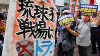 Peserta aksi mengenang korban bom atom sekaligus menyerukan perdamaian global. REUTERS/Kim Kyung-Hoon