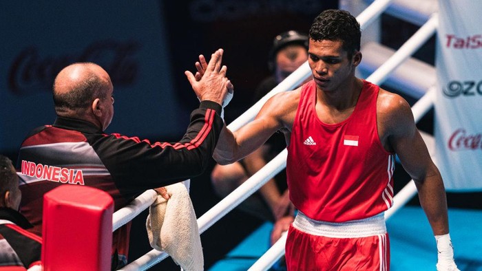 AMMAN, JORDAN - MARCH 03: Maikhel Roberrd Muskita of Indonesia (R) reacts after his win during Mens Middle weight (69-75kg) fight against George Tanoa of American Samoa on March 03, 2020 in Prince Hamza Hall Al-Hussein Youth City, Amman, Jordan. (Photo by Lampson Yip - Clicks Images/Getty Images)