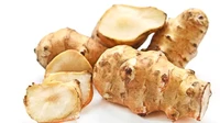 Tampilannya mirip jahe tapi rasanya seperti kentang, inilah Sunchoke. Sayuran ini dikenal sebagai kentang ramah penderita diabetes karena tidak memengaruhi kadar gula darah ketika dikonsumsi. Sunchoke bisa dipanggang atau direbus. Foto: Shutterstock via Mashed
