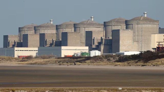 The Gravelines nuclear power plant is seen across the beach in Petit Fort Philippe, northern France, March 10, 2017. REUTERS/Pascal Rossignol/File Photo Purchase Licensing Rights