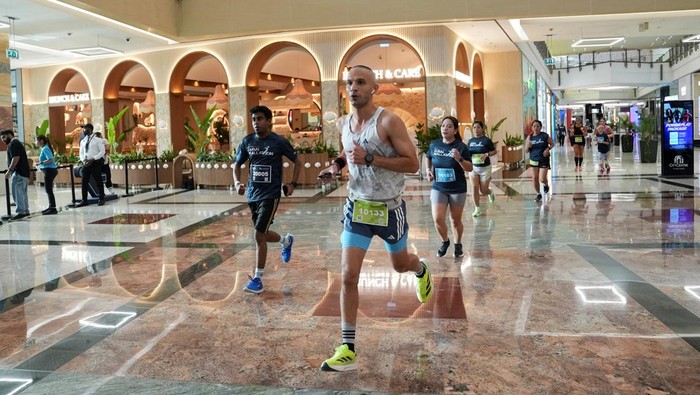 Participants run during the Dubai Mallathon in City Centre Mirdif Mall, in Dubai, United Arab Emirates, August 9, 2025. REUTERS/Raghed Waked