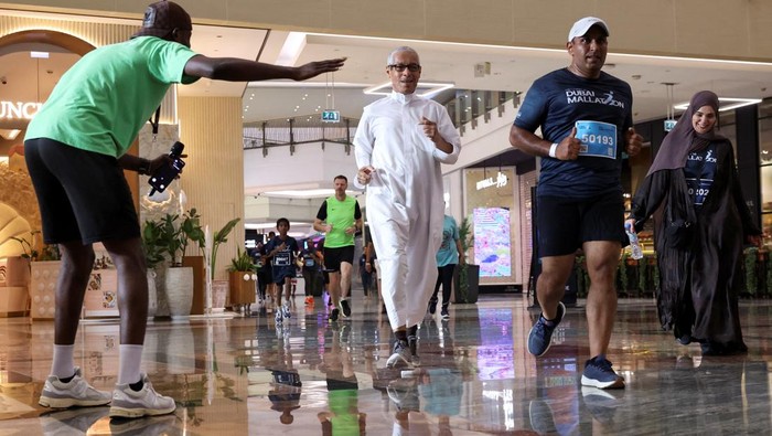 Participants run the Dubai Mallathon, a month-long fitness initiative transforming shopping centres into indoor running tracks throughout August, to escape the scorching summer heat, at City Centre Mirdif in Dubai, United Arab Emirates, August 9, 2025. REUTERS/Amr Alfiky
