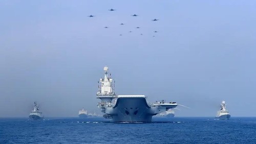 Warships and fighter jets of the Chinese Peoples Liberation Army (PLA) Navy take part in a military display in the South China Sea April 12, 2018. (File photo: Reuters)