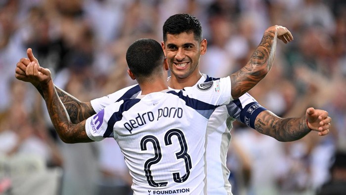 Cristian Romero UDINE, ITALY - AUGUST 13: Cristian Romero of Tottenham Hotspur celebrates scoring his team's second goal with teammate Pedro Porro during the UEFA Super Cup 2025 match between Paris Saint-Germain and Tottenham Hotspur at Stadio Friuli on August 13, 2025 in Udine, Italy. (Photo by Tullio Puglia - UEFA/UEFA via Getty Images)
