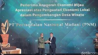 Kategori Kontribusi Ekonomi Kemasyarakatan, PT Permodalan Nasional Madani meraih Anugerah Ekonomi Hijau Apresiasi atas Penguatan Ekonomi Lokal dalam Pengembangan Desa Wisata.