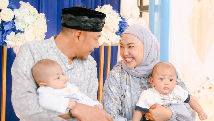 Potret Mpok Alpa dan Keluarga Potret Mpok Alpa dan Keluarga.