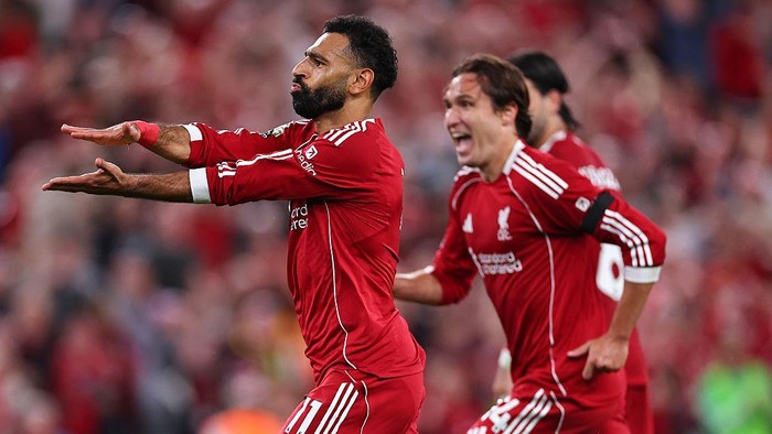 LIVERPOOL, ENGLAND - AUGUST 15: Mohamed Salah of Liverpool celebrates after scoring a goal to make it 4-2 during the Premier League match between Liverpool and Bournemouth at Anfield on August 15, 2025 in Liverpool, England. (Photo by Robbie Jay Barratt - AMA/Getty Images)