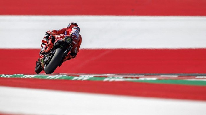 Ducati Lenovo teams Spanish rider Marc Marquez drives during the second free practice session ahead of the Austrian MotoGP Grand Prix at the Red Bull Ring race track in Spielberg, Austria, on August 16, 2025. (Photo by ERWIN SCHERIAU / APA / AFP) / Austria OUT