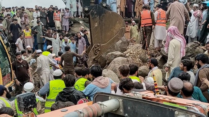 Rescuers search for victims at the site of a flashflood in Salarzai Tehsil of Pakistans Bajaur district onAugust15,2025. Heavy monsoon rains triggered landslides and flash floods across northern Pakistan, killing at least 50 people in the last 24 hours, disaster authorities said August 15. (Photo by AFP)