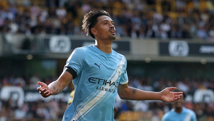 Soccer Football - Premier League - Wolverhampton Wanderers v Manchester City - Molineux Stadium, Wolverhampton, Britain - August 16, 2025 Manchester Citys Tijjani Reijnders celebrates scoring their second goal Action Images via Reuters/Paul Childs EDITORIAL USE ONLY. NO USE WITH UNAUTHORIZED AUDIO, VIDEO, DATA, FIXTURE LISTS, CLUB/LEAGUE LOGOS OR LIVE SERVICES. ONLINE IN-MATCH USE LIMITED TO 120 IMAGES, NO VIDEO EMULATION. NO USE IN BETTING, GAMES OR SINGLE CLUB/LEAGUE/PLAYER PUBLICATIONS. PLEASE CONTACT YOUR ACCOUNT REPRESENTATIVE FOR FURTHER DETAILS..