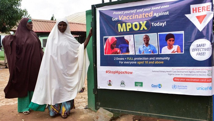 People depart a Primary Health Care Center after receiving mpox vaccination, following the resurgence of mpox cases in Igabi, Kaduna, Nigeria, August 18, 2025. REUTERS/Nuhu Gwamna  REFILE - CORRECTING NAME FROM 