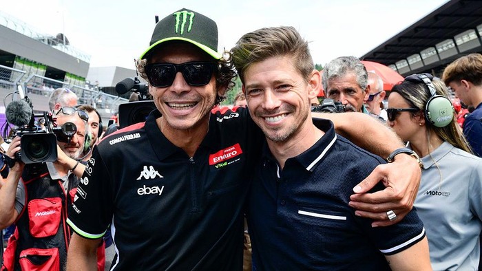SPIELBERG, AUSTRIA - AUGUST 17: Valentino Rossi of Italy and nine times MotoGP world champion and Casey Stoner of Australia and two times MotoGP world champion on the grid during the MotoGP of Austria race at Red Bull Ring on August 17, 2025 in Spielberg, Austria. (Photo by Gold & Goose Photography/Getty Images)