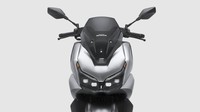 Secara tampilan, Honda NWT150 menggunakan DNA yang sama seperti Honda NWG150, yakni berdimensi bongsor dengan aksen mematah di hampir seluruh bagian. Sementara lampu utama atau headlamp-nya berukuran besar dengan windshield atau penghalang angin yang cukup dominan. Foto: Doc. Wuyang Honda