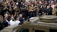 Kunjungan ini berlangsung setelah pemerintahannya mengerahkan pasukan Garda Nasional ke Washington, menyusul meningkatnya ketegangan politik dan demonstrasi di berbagai titik strategis kota. REUTERS/Nathan Howard