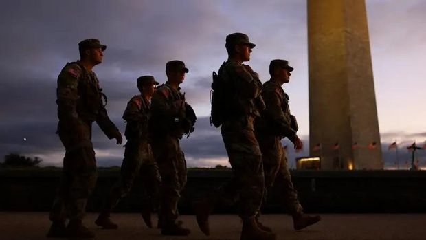 Members of the National Guard walk at the National Mall after U.S. President Donald Trump deployed National Guard troops and ordered an increased presence of federal law enforcement to assist in crime prevention, in Washington, D.C., U.S., August 21, 2025. (File photo: Reuters)