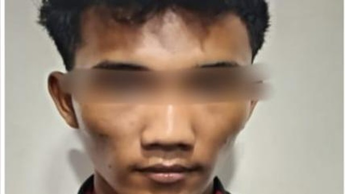 Pelaku SM saat ditangkap polisi.