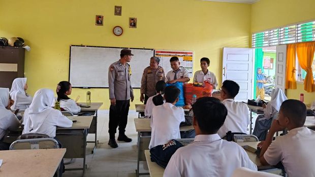 Polres Siak mendistribusikan MBG kepada 6 ribu penerima manfaat mulai pelajar hingga bumil, Selasa (26/8/2025).