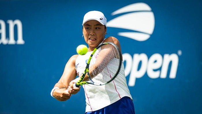 NEW YORK, NEW YORK - AUGUST 24: Janice Tjen of Indonesia in action against Veronika Kudermetova in the first round on Day 1 of the US Open at USTA Billie Jean King National Tennis Center on August 24, 2025 in New York City (Photo by Robert Prange/Getty Images)