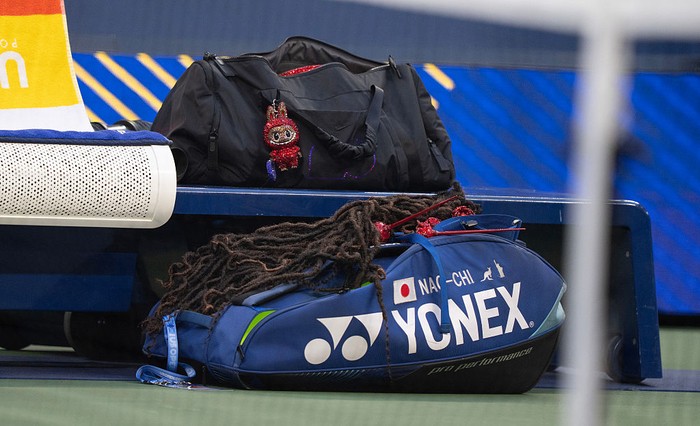 NEW YORK, NEW YORK - AUGUST 25: Detailed view of the bag of Naomi Osaka of Japan with a bedazzled Labubu and her headdress during her Womens Singles First Round match on Day Three against Greet Minnen of Belgium at the 2025 US Open at USTA Billie Jean King National Tennis Center on August 24, 2025 in New York City. (Photo by Susan Mullane/ISI Photos/ISI Photos via Getty Images)