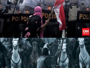 Potret Ibu Berhijab Merah Muda Viral, Disejajarkan Battle of the Bastards