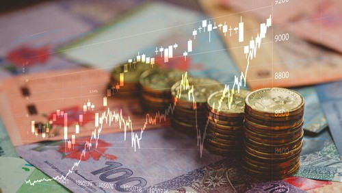 Image of Finance background with Malaysian Currency note , Coins and stock chart. Finance Trading concept