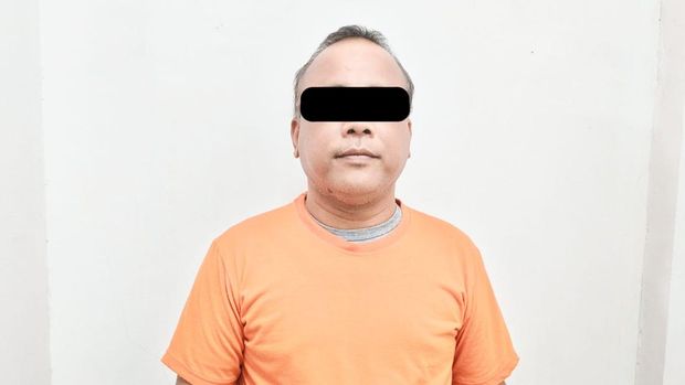 MR, tersangka yang berperan sebagai provokator pengeroyokan dua sekuriti Bandara I Gusti Ngurah Rai, Bali.