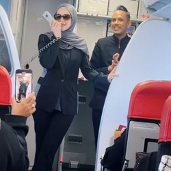Momen Langka Siti Nurhaliza Nyanyi di Pesawat Hibur Penumpang