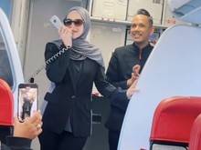 Momen Langka Siti Nurhaliza Nyanyi di Pesawat Hibur Penumpang